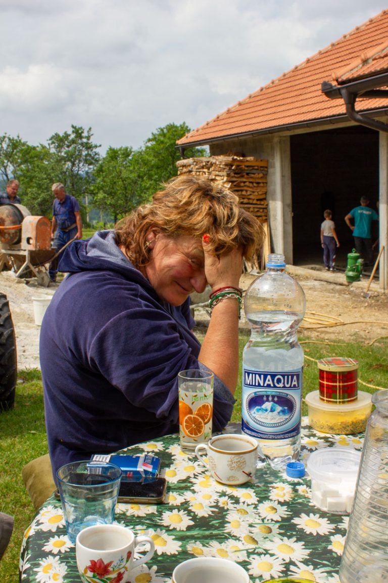 a woman at the table taking a break from work