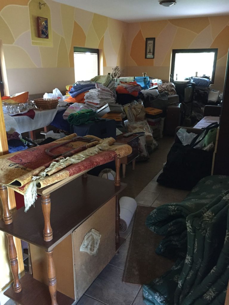 house interior with belongings ready to be sorted