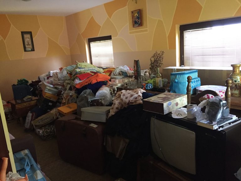 a slava room full of stuff ready for sorting