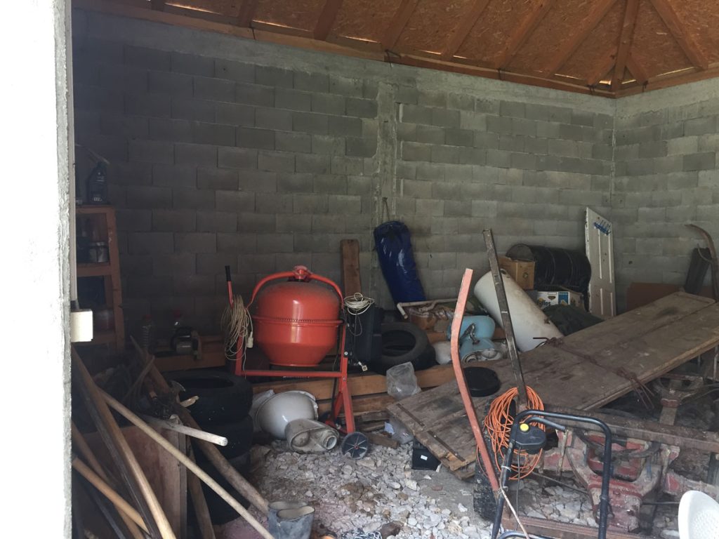 a garage interior with machines and appliances