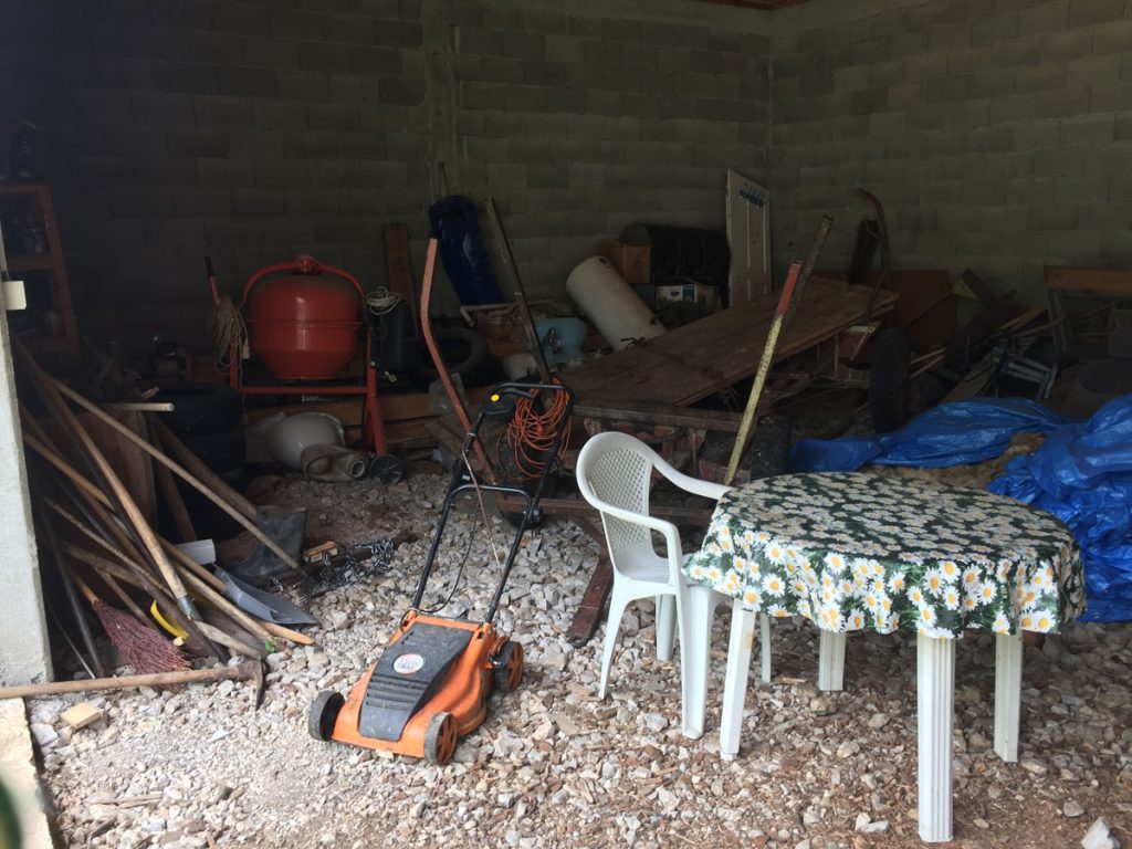 a garage interior with machines and appliances