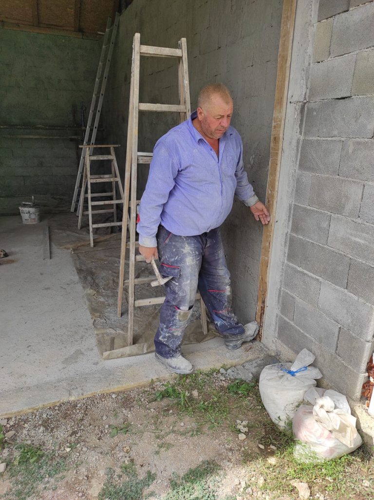 a worker prepairing for mortaring