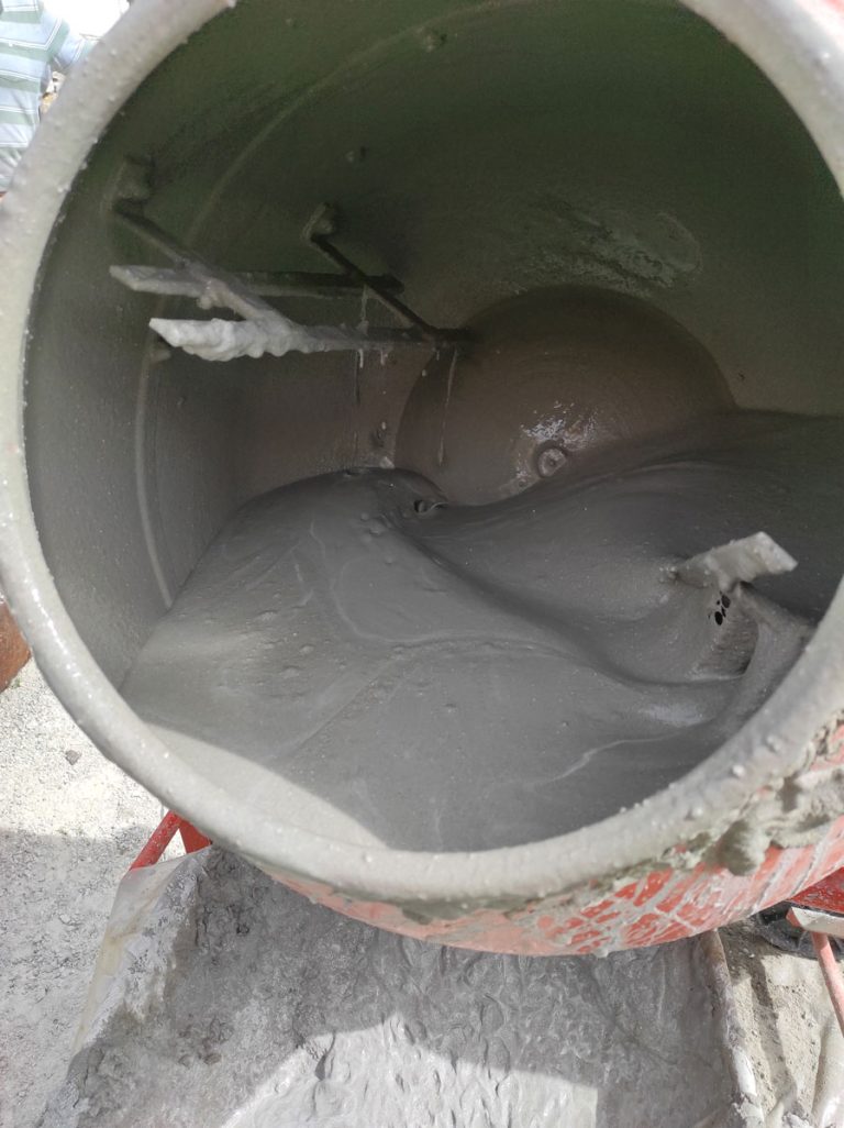 fresh concrete in a concrete mixer