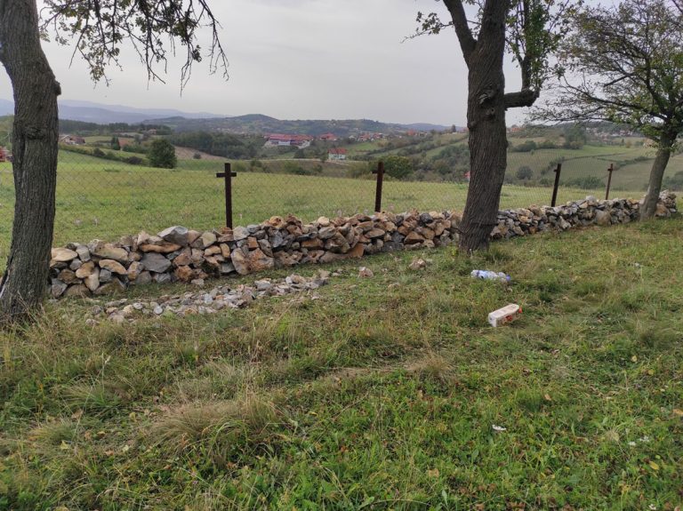 a stonewall by the fence