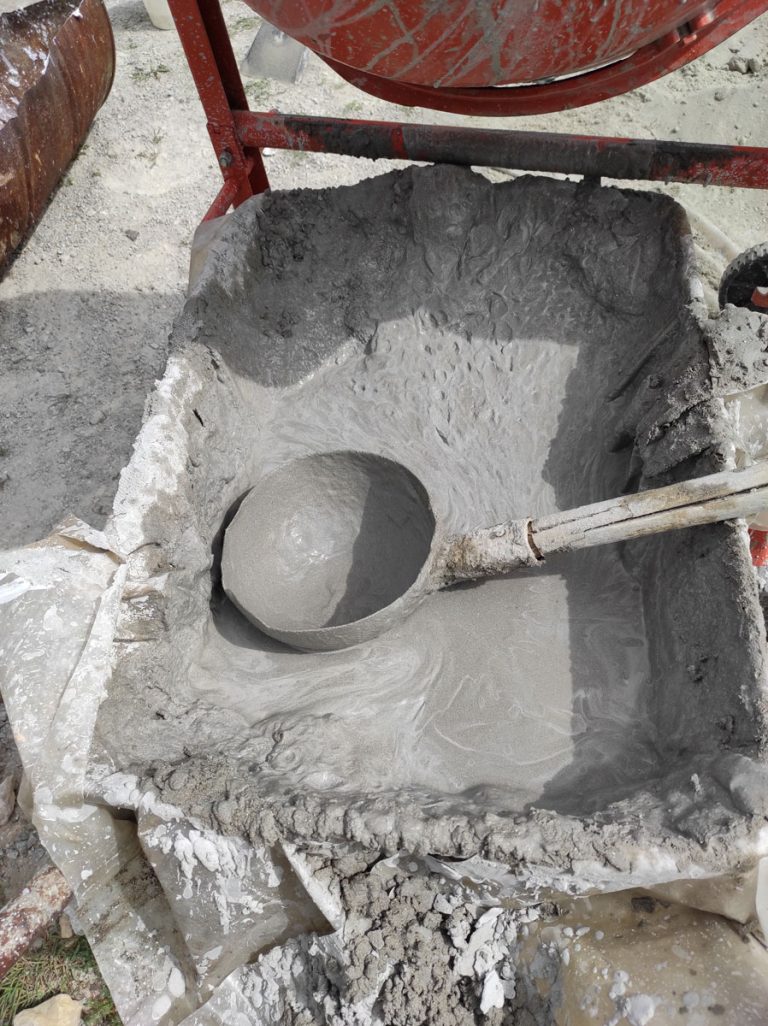 wheelbarrow full of mortar