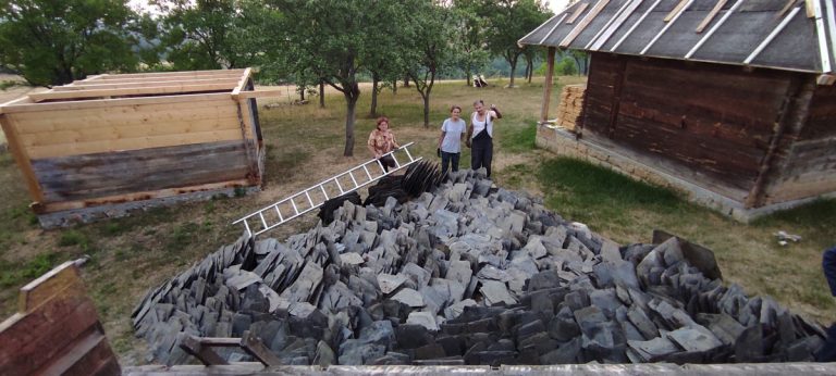 workers by slate pile