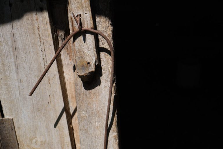 an old chicken coop locking mechanism