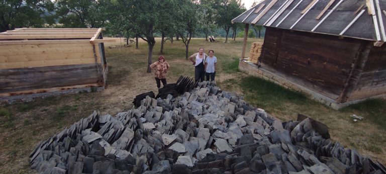 workers by slate pile