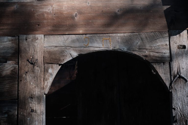 an old wooden cottage door frame arch