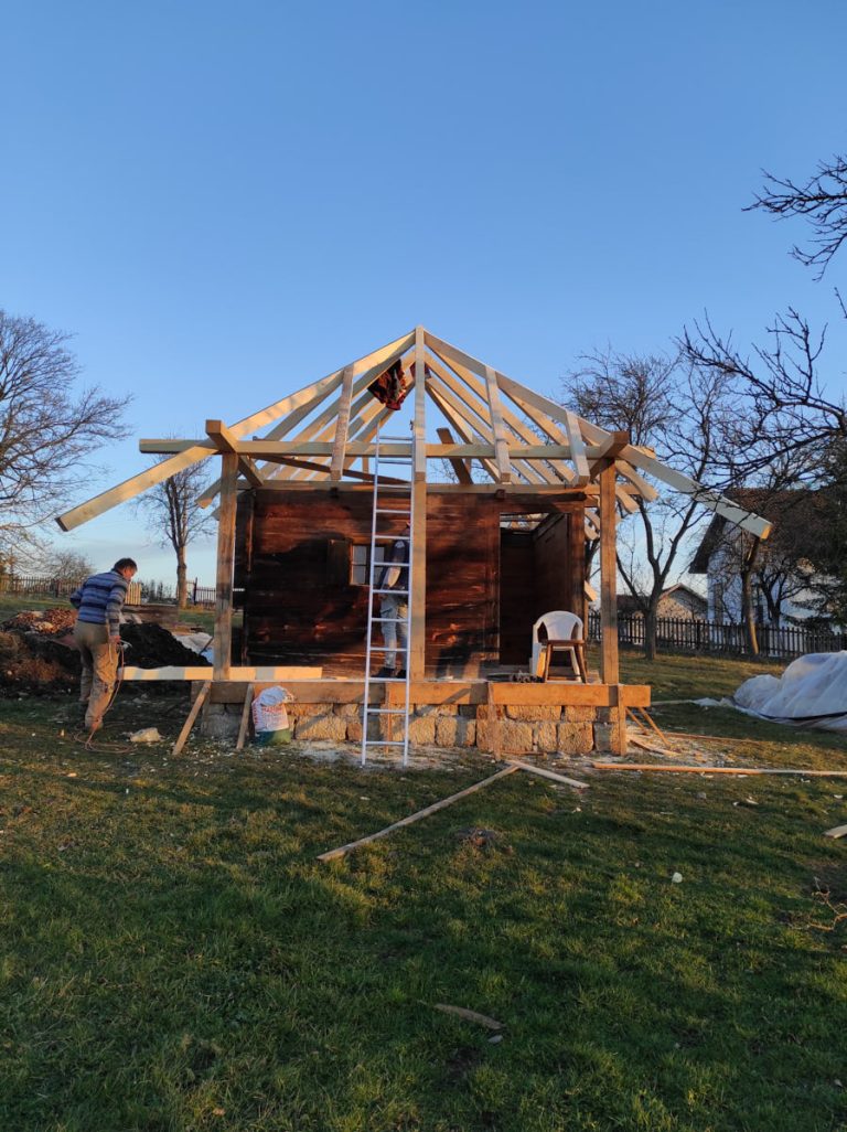 workers building a new roof construction