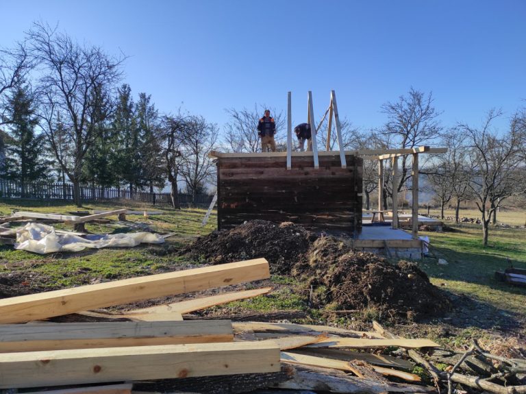 workers building a new roof construction