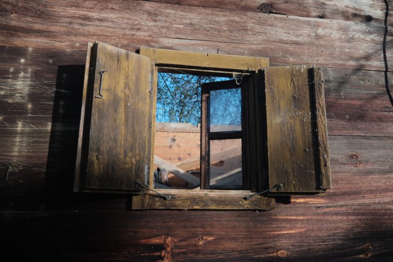 an old wooden cottage window