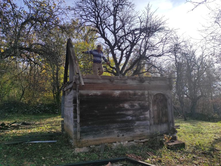 an old wooden cottage disassembling process