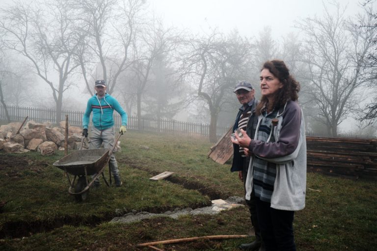 workers building a cottage foundation