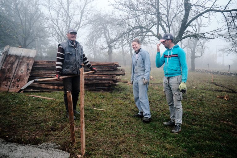 workers having fun while building a cottage foundation