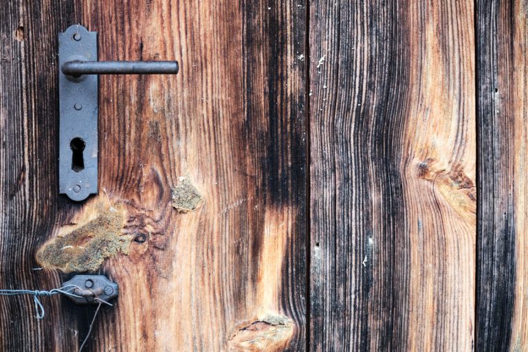 an old wooden door handle detail