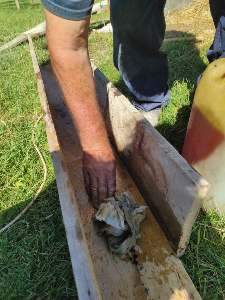a worker building a wooden reinforcement
