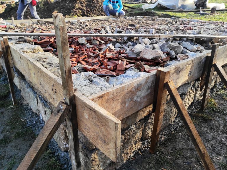 workers building a cottage foundation slab