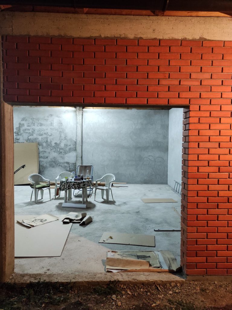 a brick wall and a garage interior