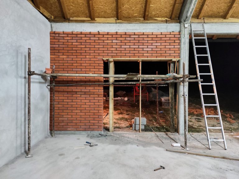 garage-workshop-brick-wall-concrete-mixer