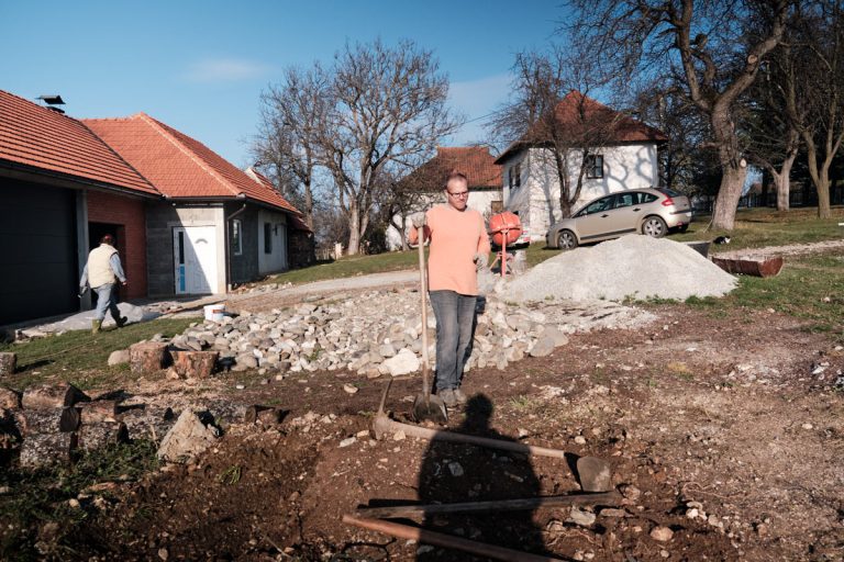 workers digging a cottage foundation