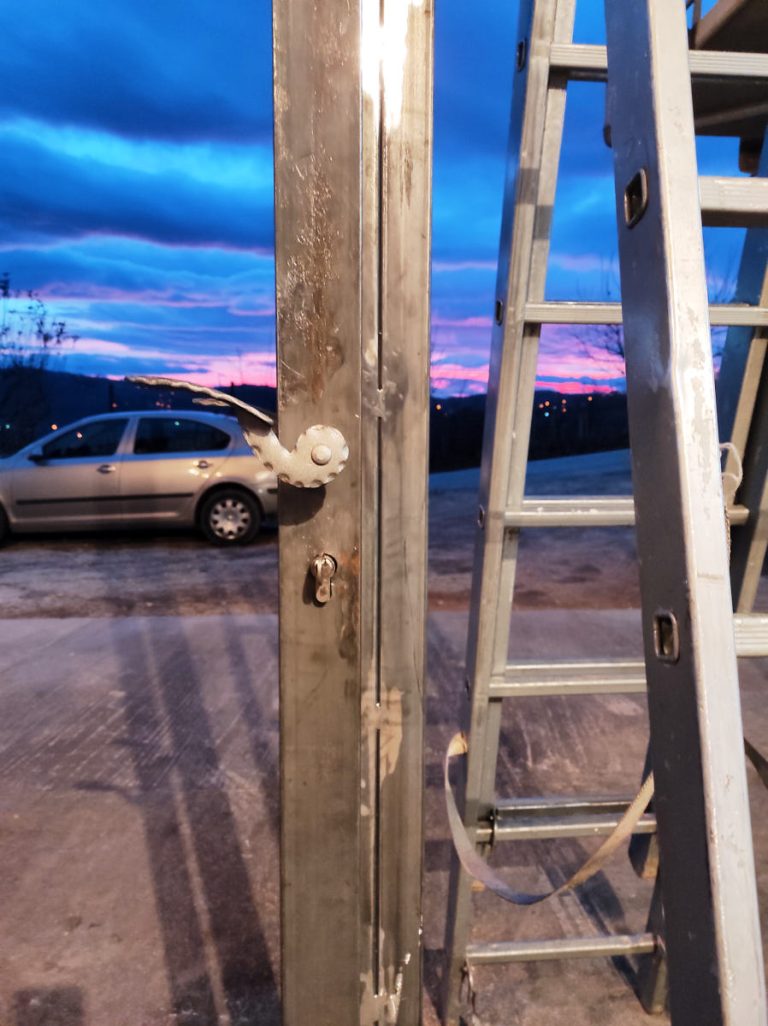 a door and window metal frame and door handle detail