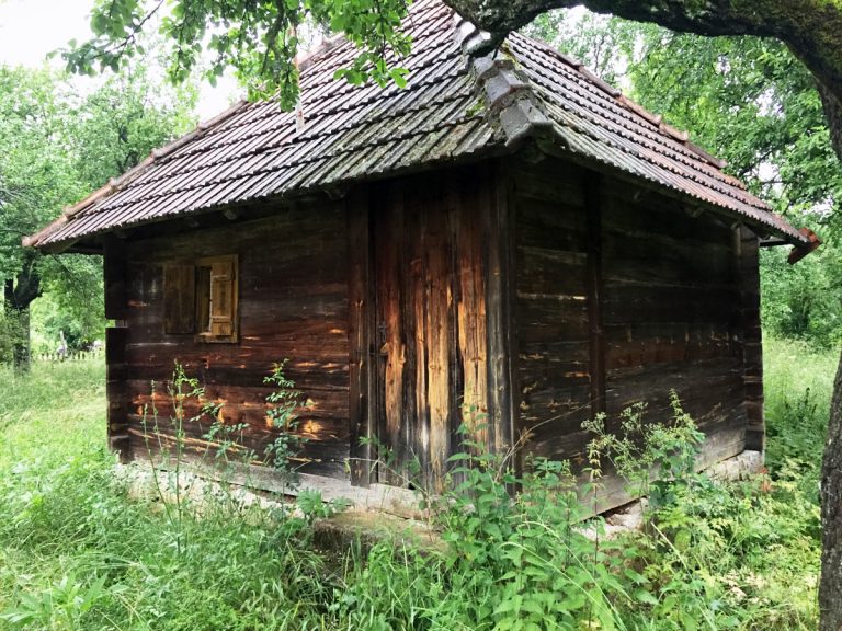 an old wooden cottage in nature