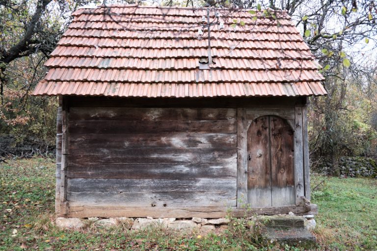 an old wooden cottage in nature