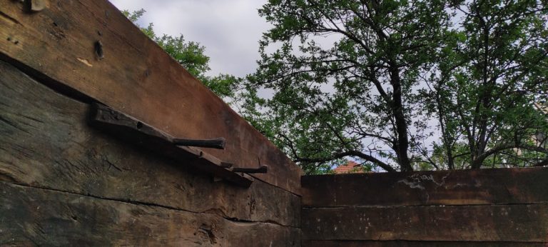 an old cottage interior with coat hanger