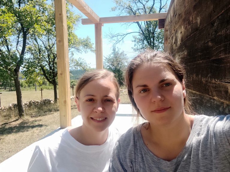 women posing during a work break