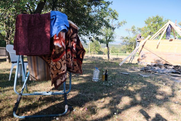 workers building a new roof construction