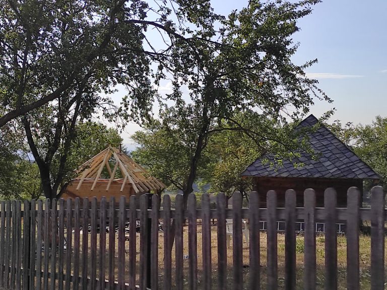 old wooden cottages in a backyard