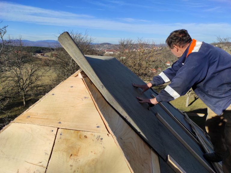 workers making new roof
