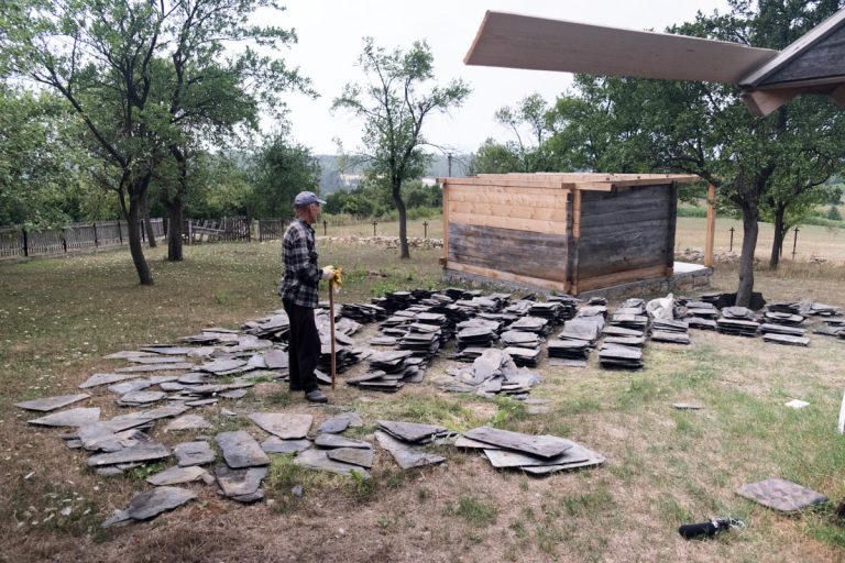 a worker on the pile of slate