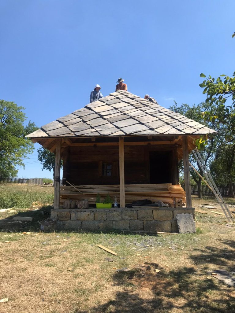 workers building a new roof