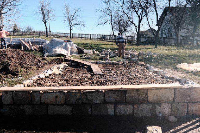 workers building a cottage foundation slab