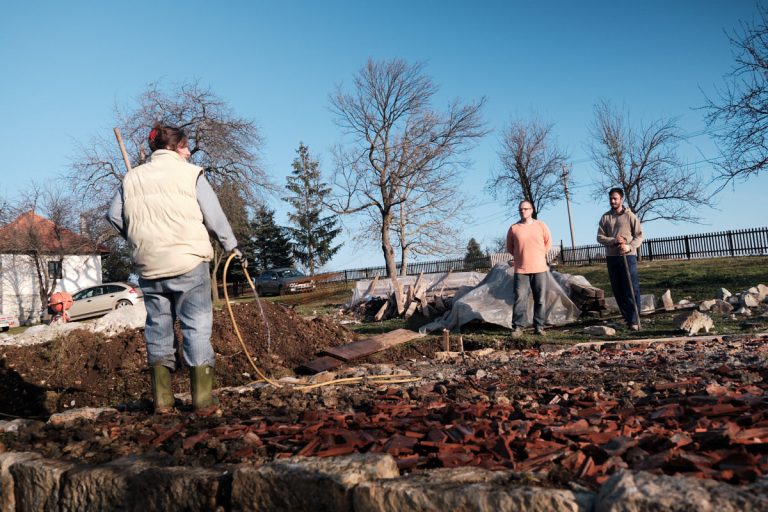 workers building a cottage foundation
