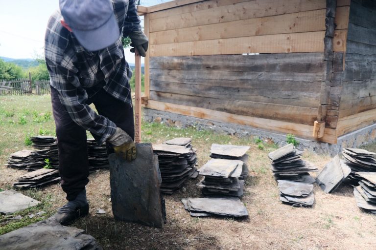 a worker measure slates