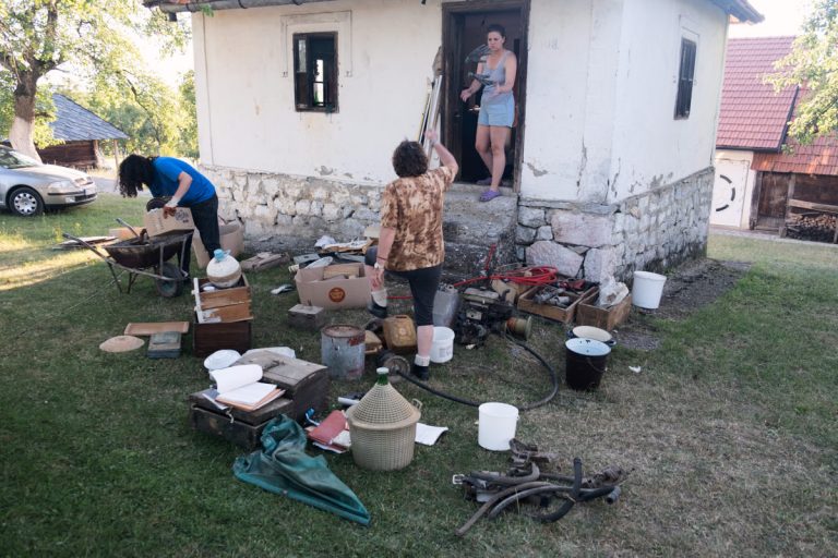 women during a spring cleaning of an old house