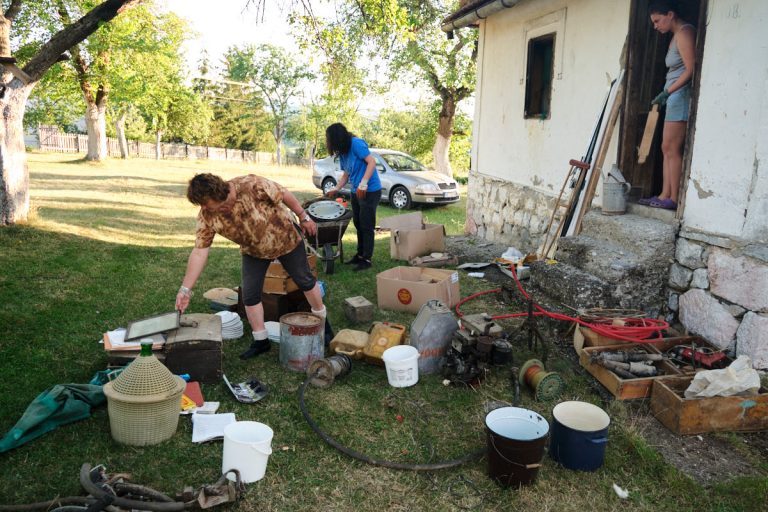 women during a spring cleaning of an old house