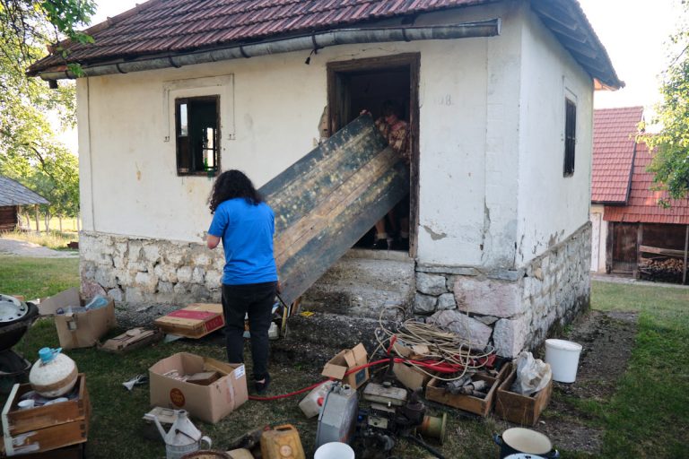 women during a spring cleaning of an old house