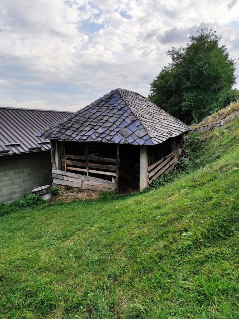 an old house with a slate roof