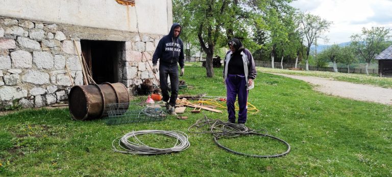 people cleaning the cellar