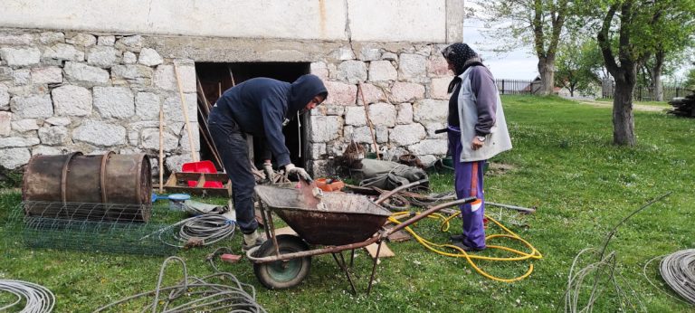 people cleaning the cellar