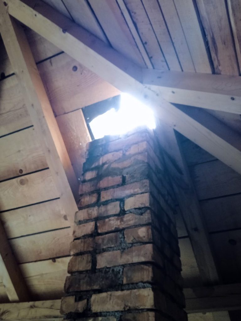 chimney and a hole in a roof