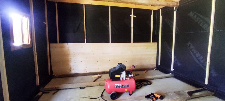 a compressor in a wooden cottage