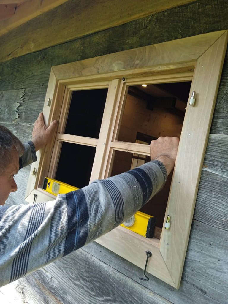 a new wooden window and a level
