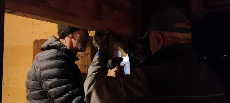 workers building a door frame