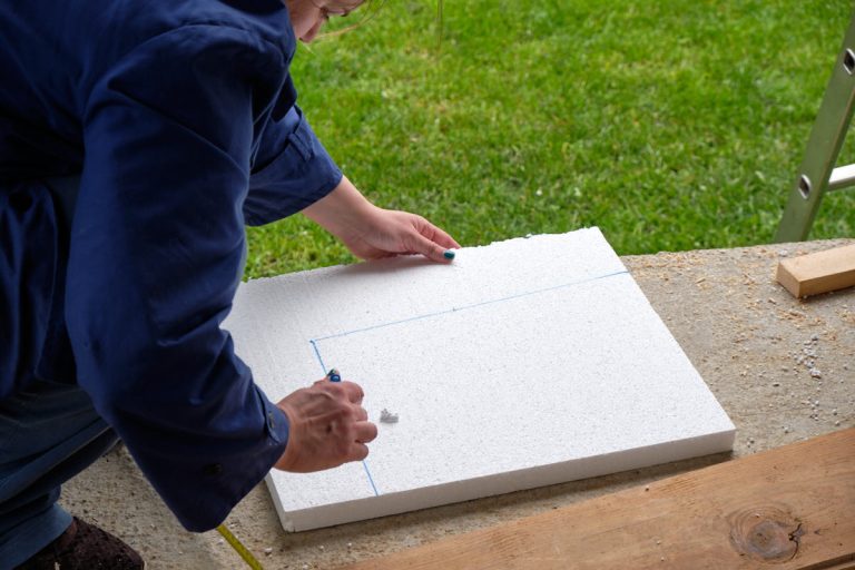 a styrofoam board marked for cutting