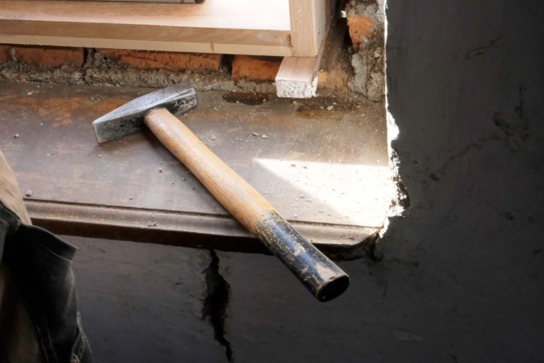 a hammer on a window stool